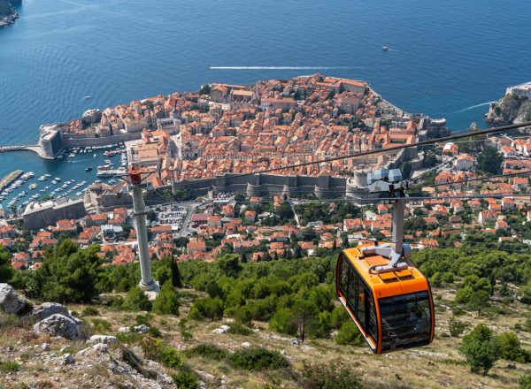 Cable Car Ascending Hill With Dubrovnik City in Background, Croatia