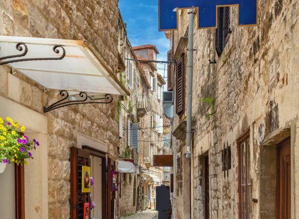 Narrow street in old town of Trogir, Croatia